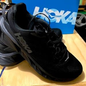 Black Hoka tennis shoe